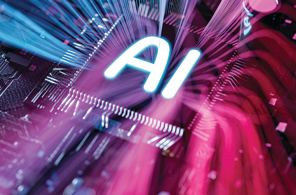 AI in white letters in dark square computer chip surrounded by printed circuit, with blue, purple and pink rays flowing out